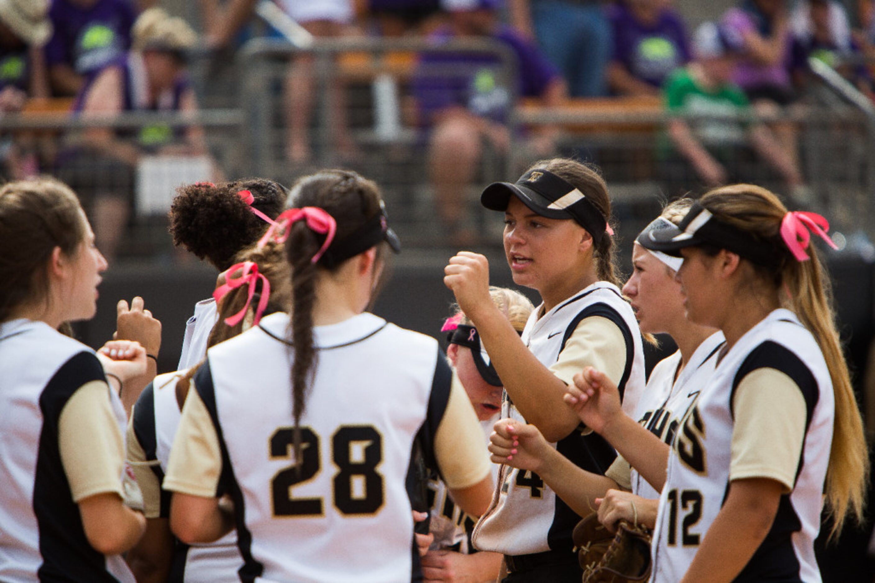 The Colony's Jayda Coleman, third from right, leads a cheer during the fifth inning of the...