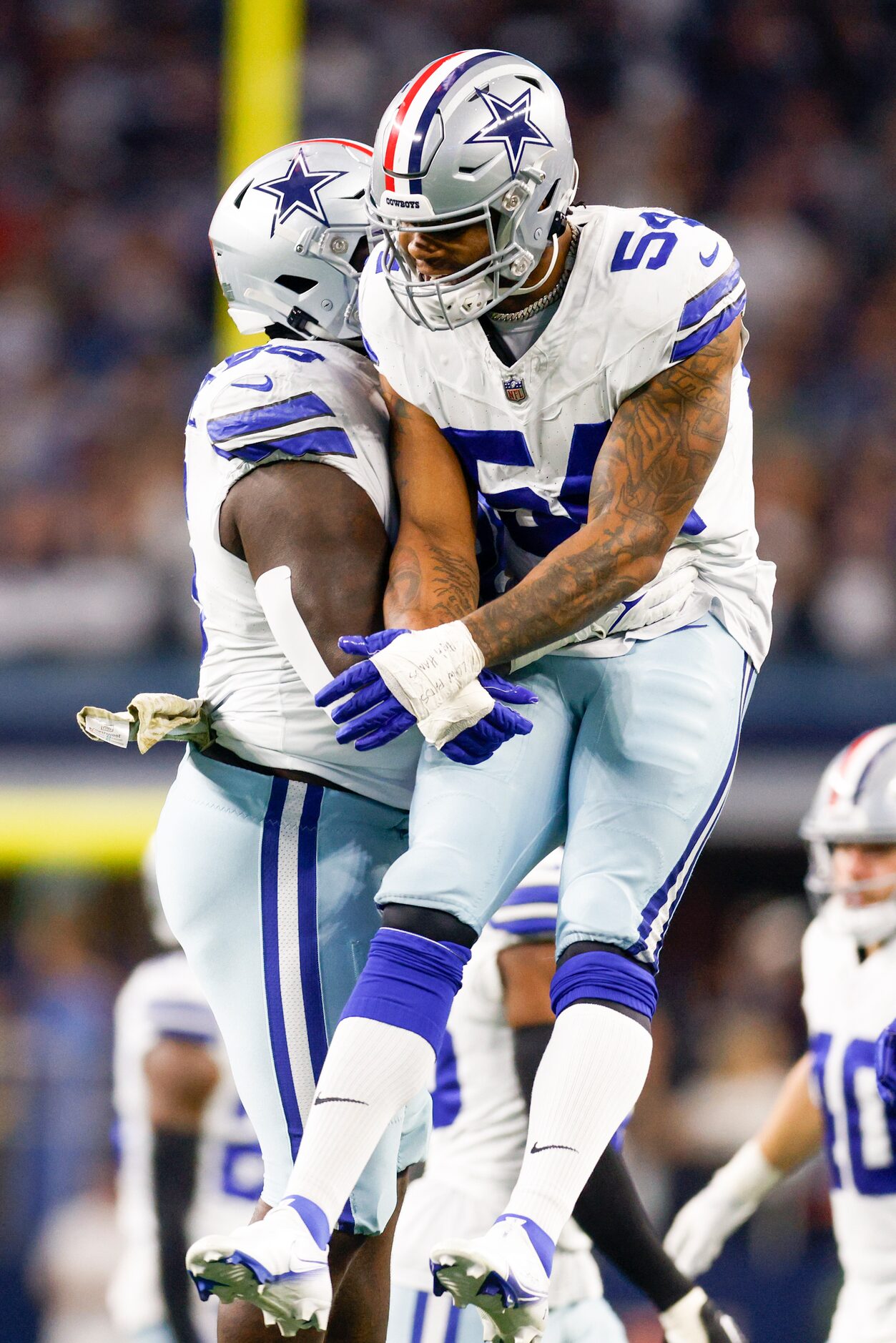 Dallas Cowboys defensive tackle Neville Gallimore (96) celebrates his sack with defensive...