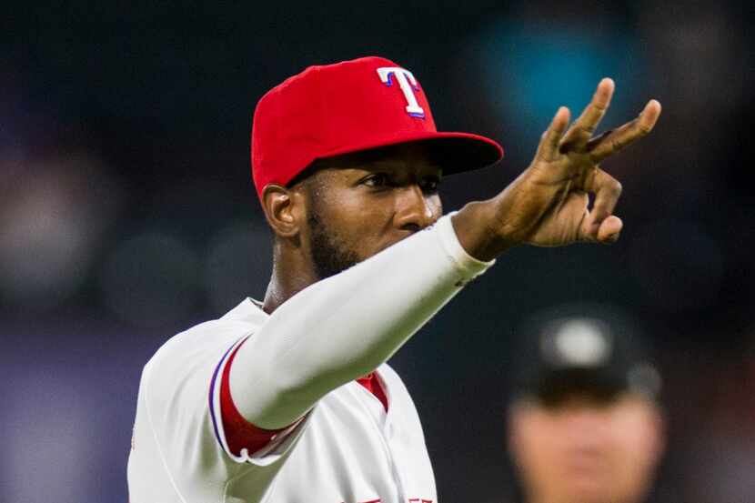Texas Rangers shortstop Jurickson Profar (19) celebrates a triple play during the fourth...