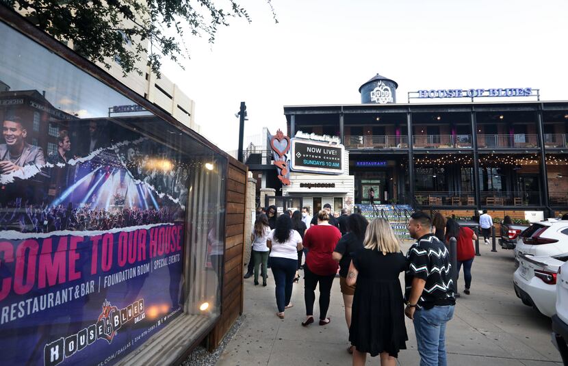 Concert attendees line up outside of the House of Blues in Dallas, a Live Nation venue, on...