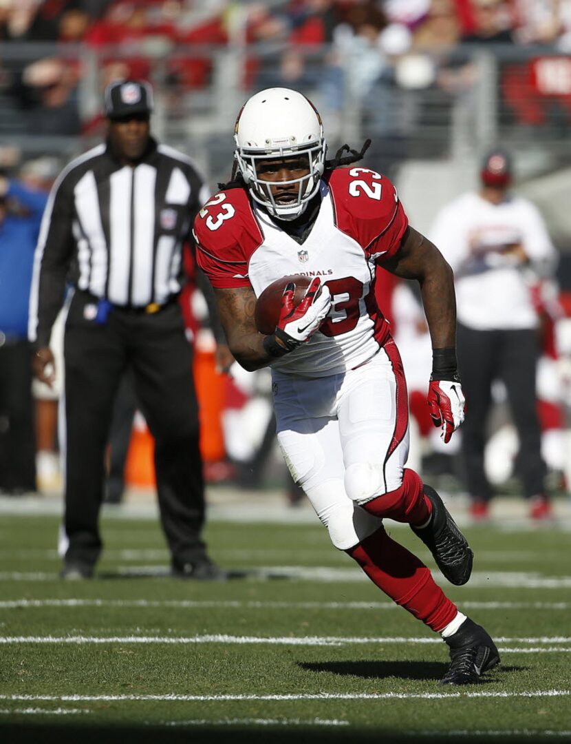 Arizona Cardinals running back Chris Johnson (23) runs against the San Francisco 49ers...