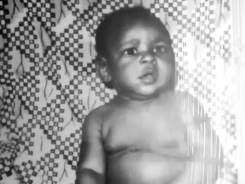 John Olajide as a baby.