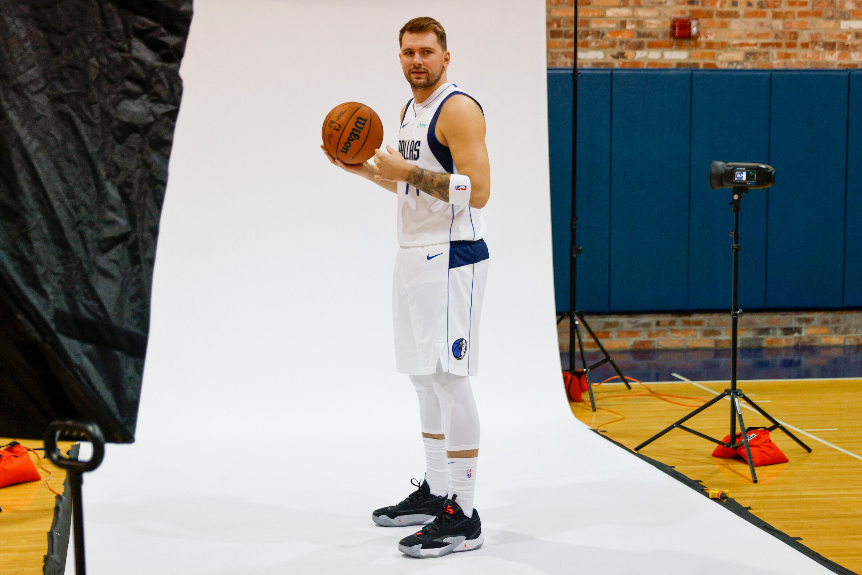 Dallas Mavericks guard Luka Doncic (77) poses for a picture during media day at American...