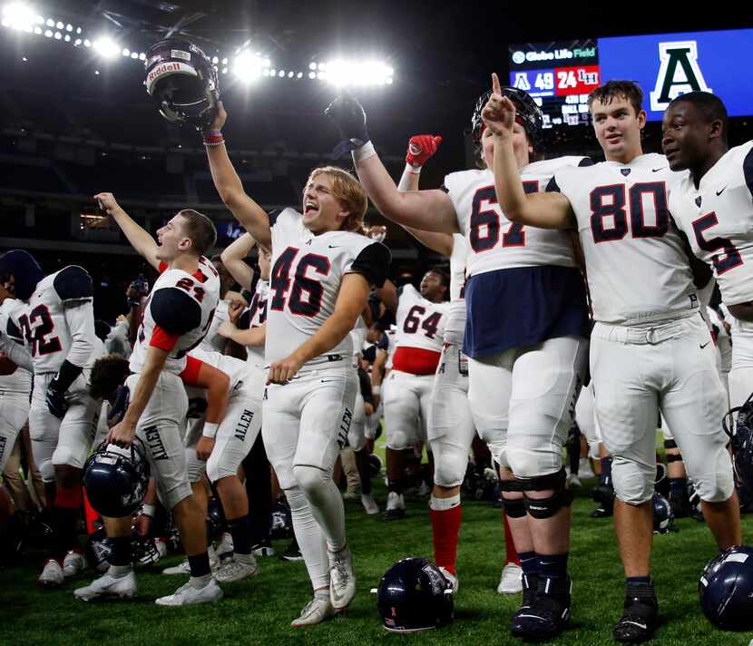 Allen Eagles punter Carter Colaluca (46) lets out a yell as he celebrates with teammates...