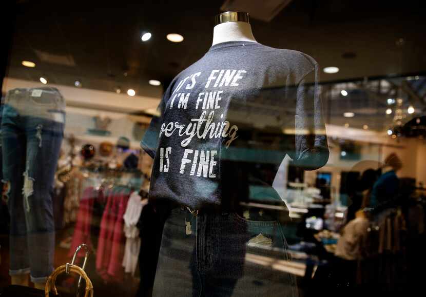 A T-shirt at Apricot Lane with lettering that reads "It's Fine, I'm Fine, Everything is...