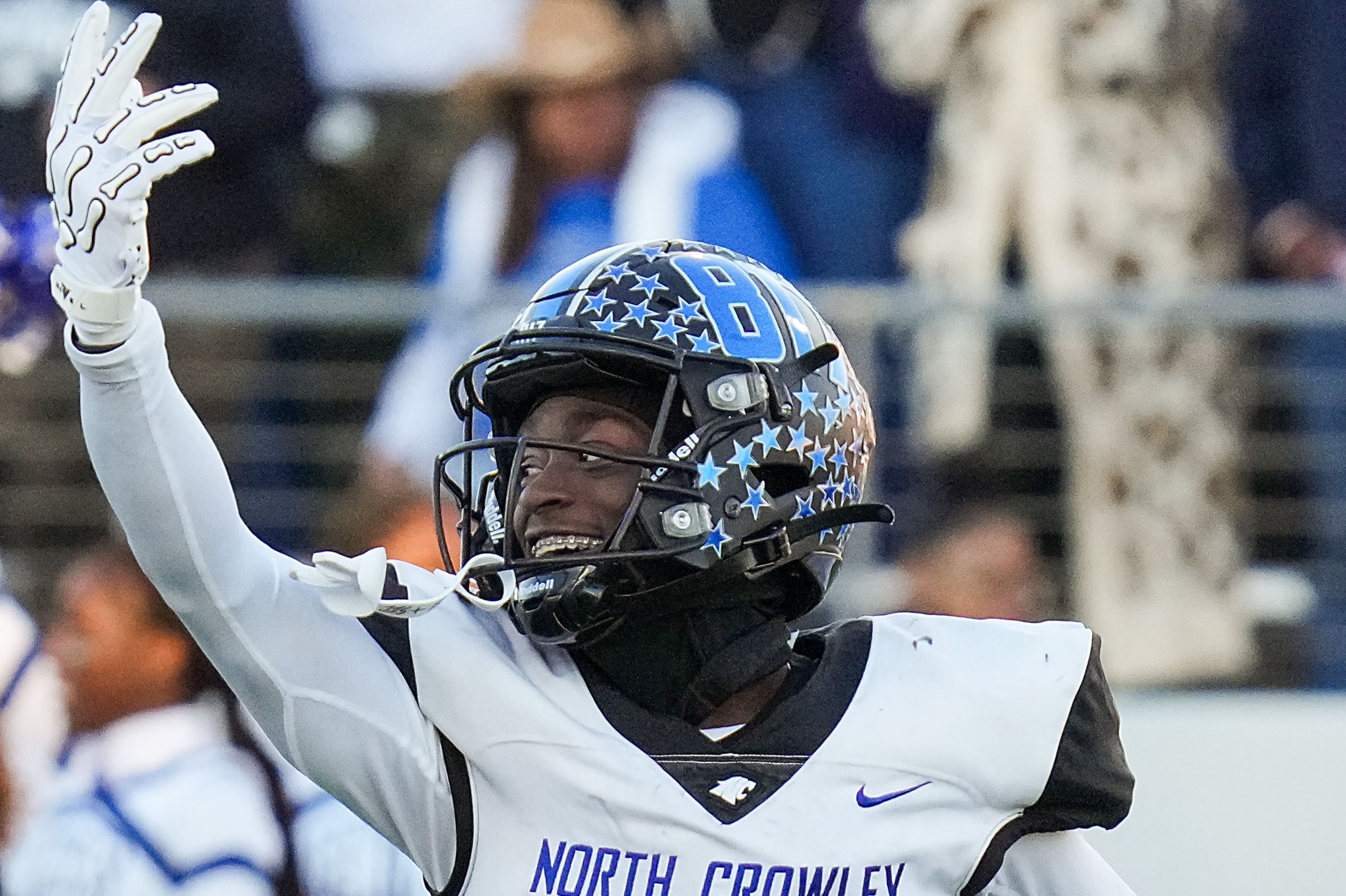 North Crowley wide receiver Quentin Gibson celebrates as time expires on a victory over...