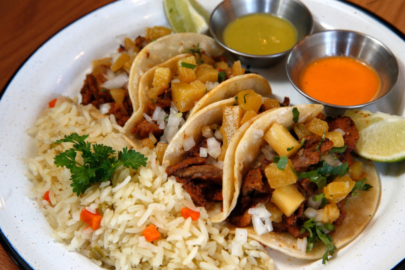 Tacos el pastor served at Americado in Fort Worth on April 9, 2017.