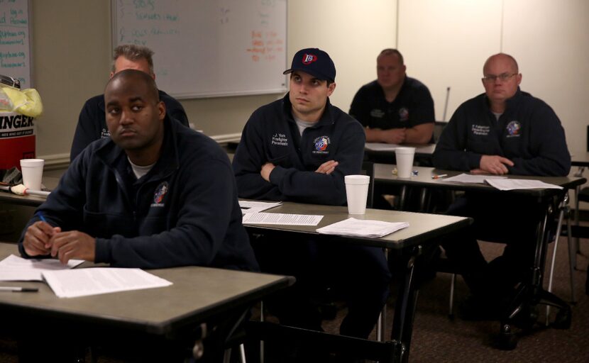 University Park firefighters sit in on a training session at the department. (Rose...