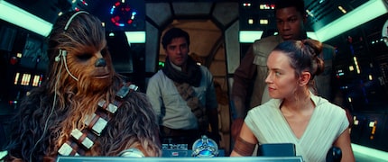 Joonas Suotamo (from left) stars as Chewbacca, Oscar Isaac as Poe Dameron, Daisy Ridley as...