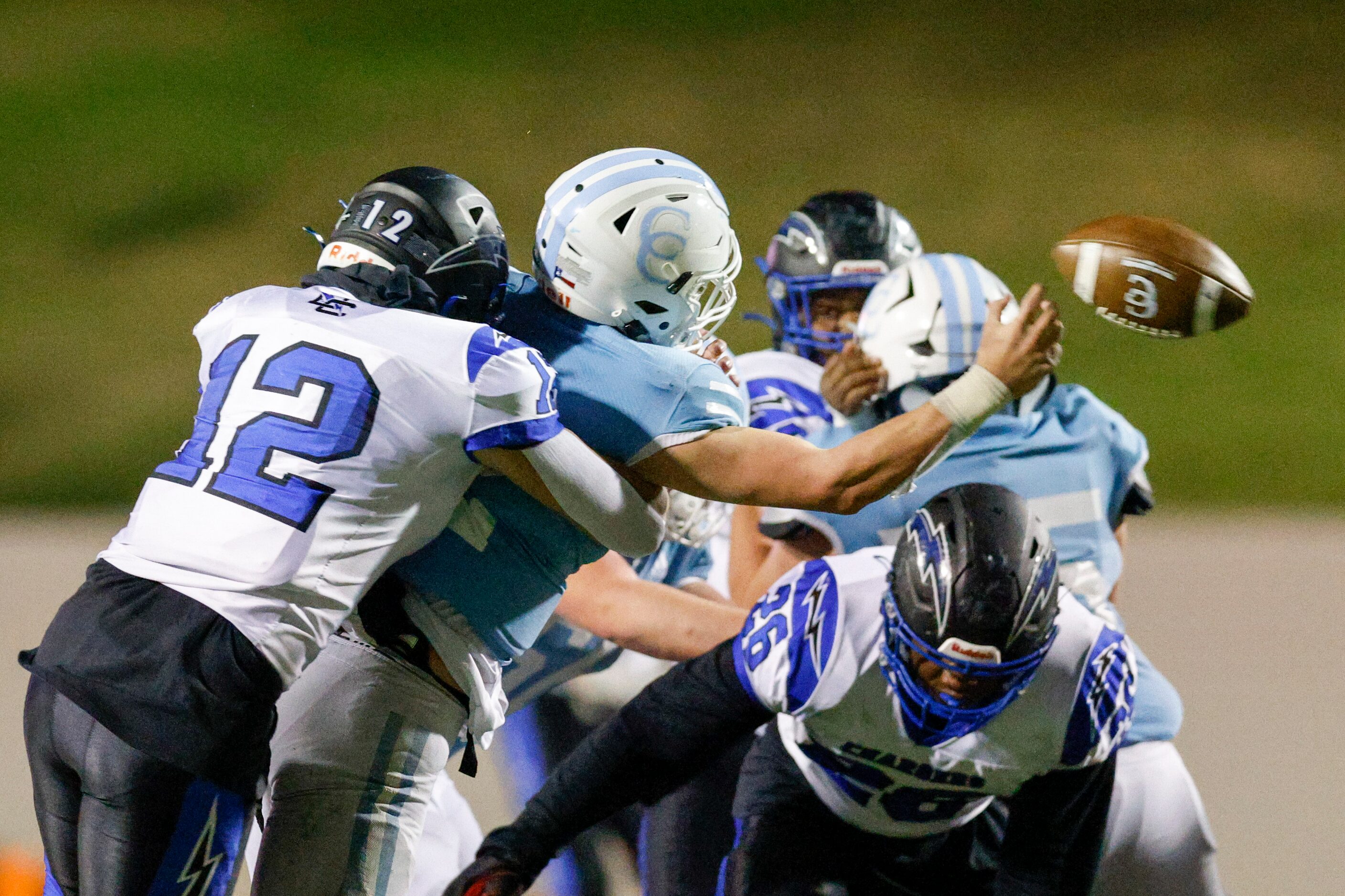 Dallas Christian defensive lineman Jackson Ivy (12) forces an incompletion from Houston...