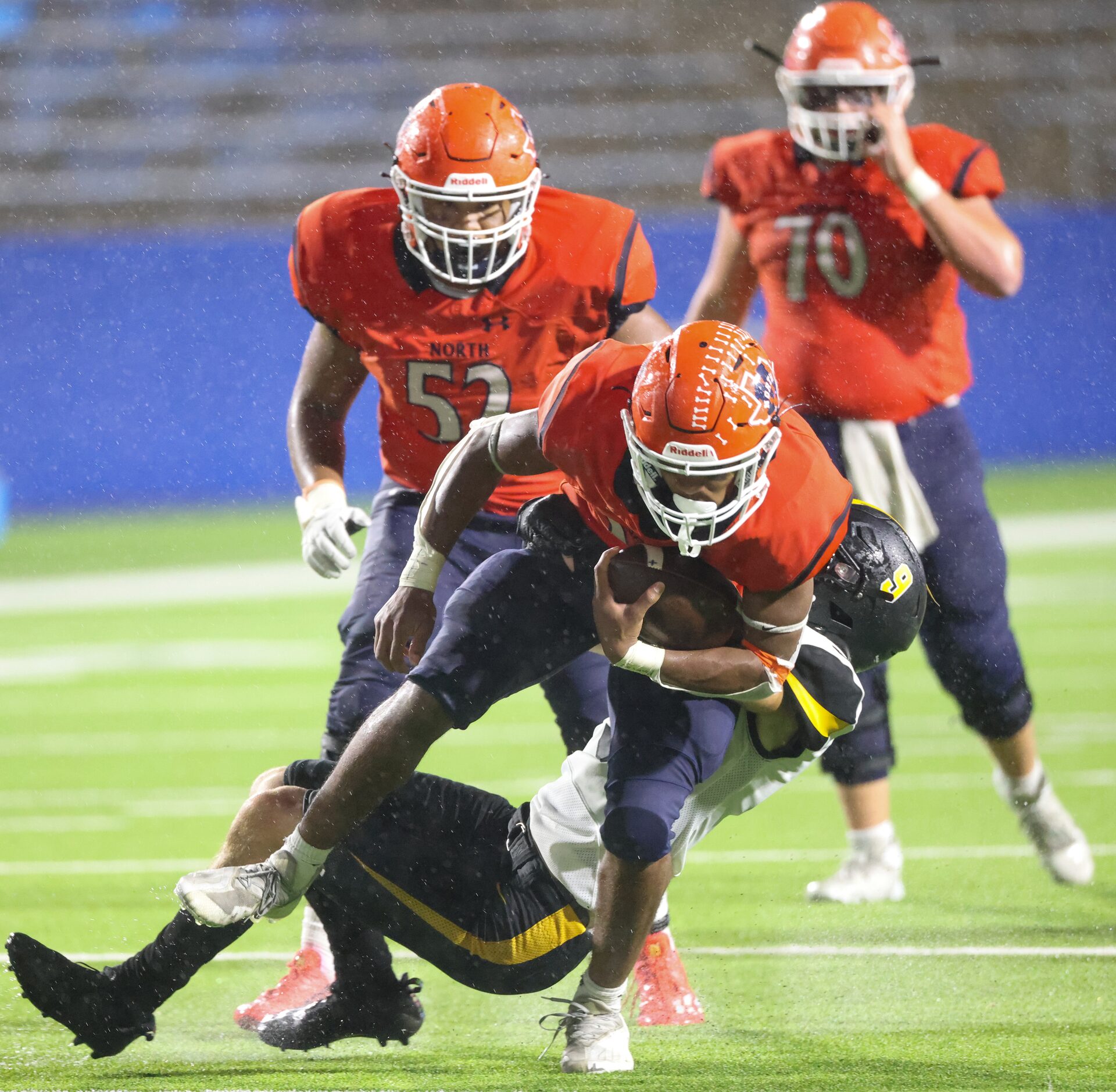 Forney defensive back Seth Hyder (9) tackles McKinney North running back Jayden Walker (26)...