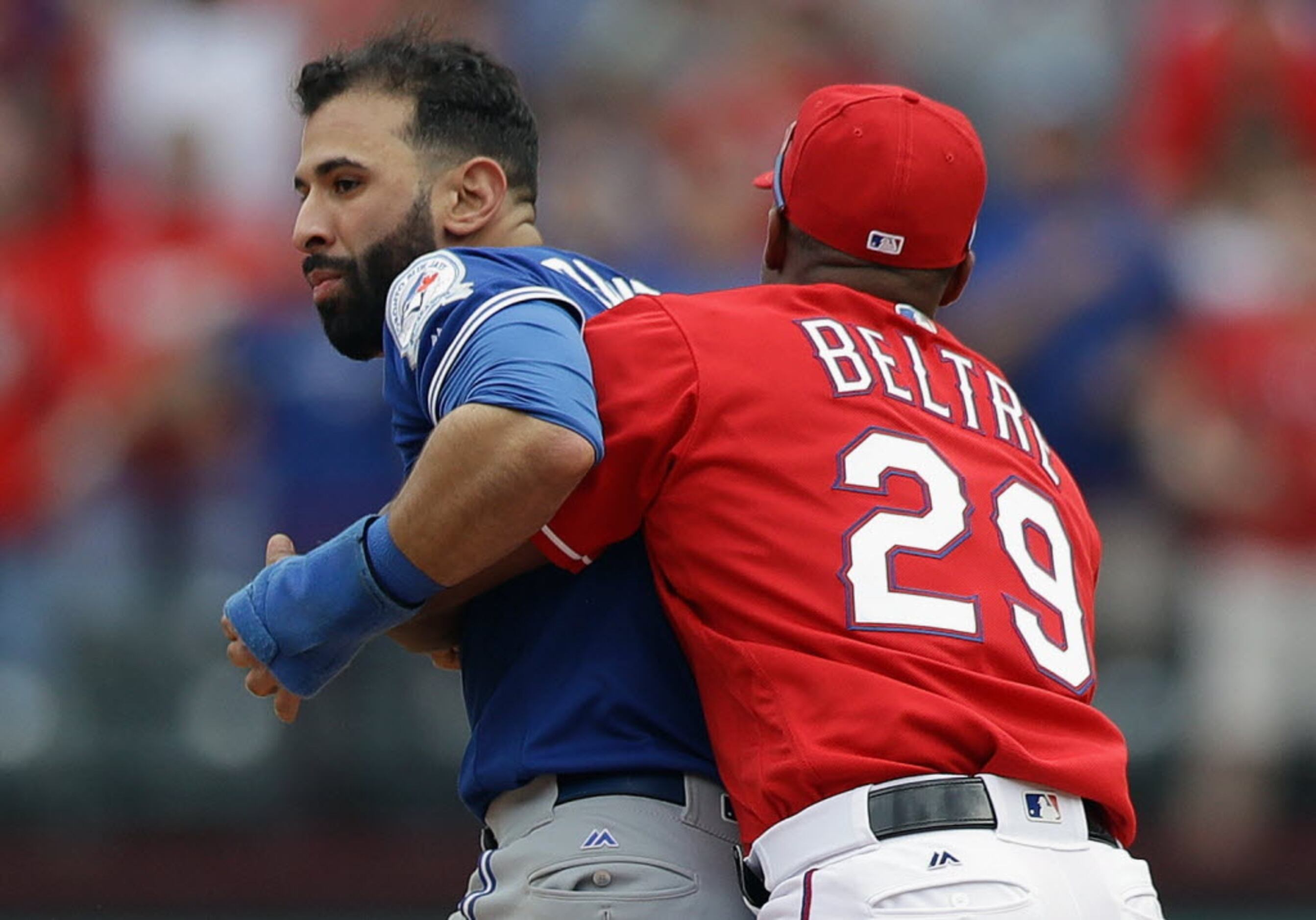 Toronto Blue Jays' Edwin Encarnacion hits a broken bat pop-out