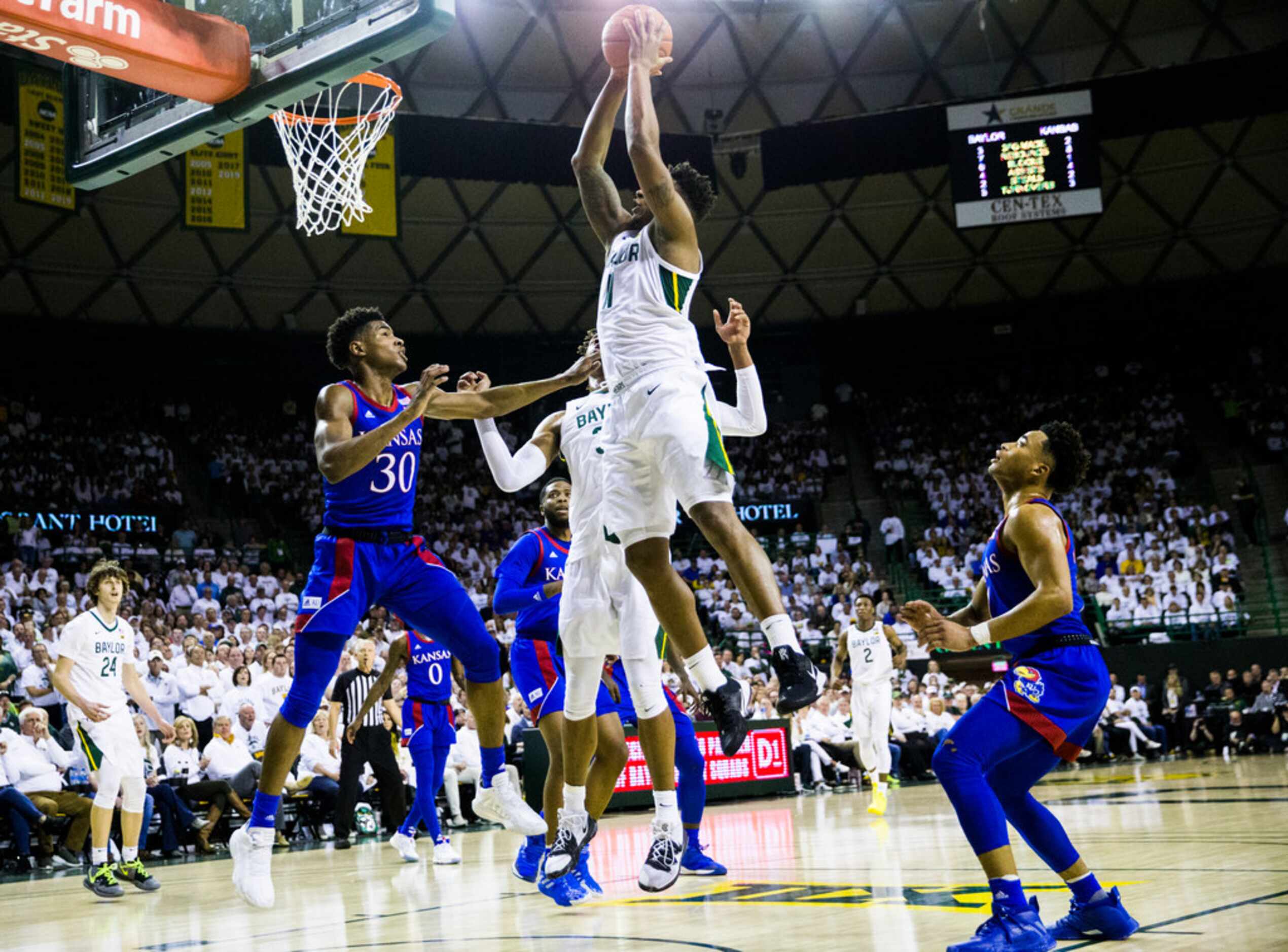 Baylor Bears guard Mark Vital (11) goes up for a shot during the first half of an NCAA men's...
