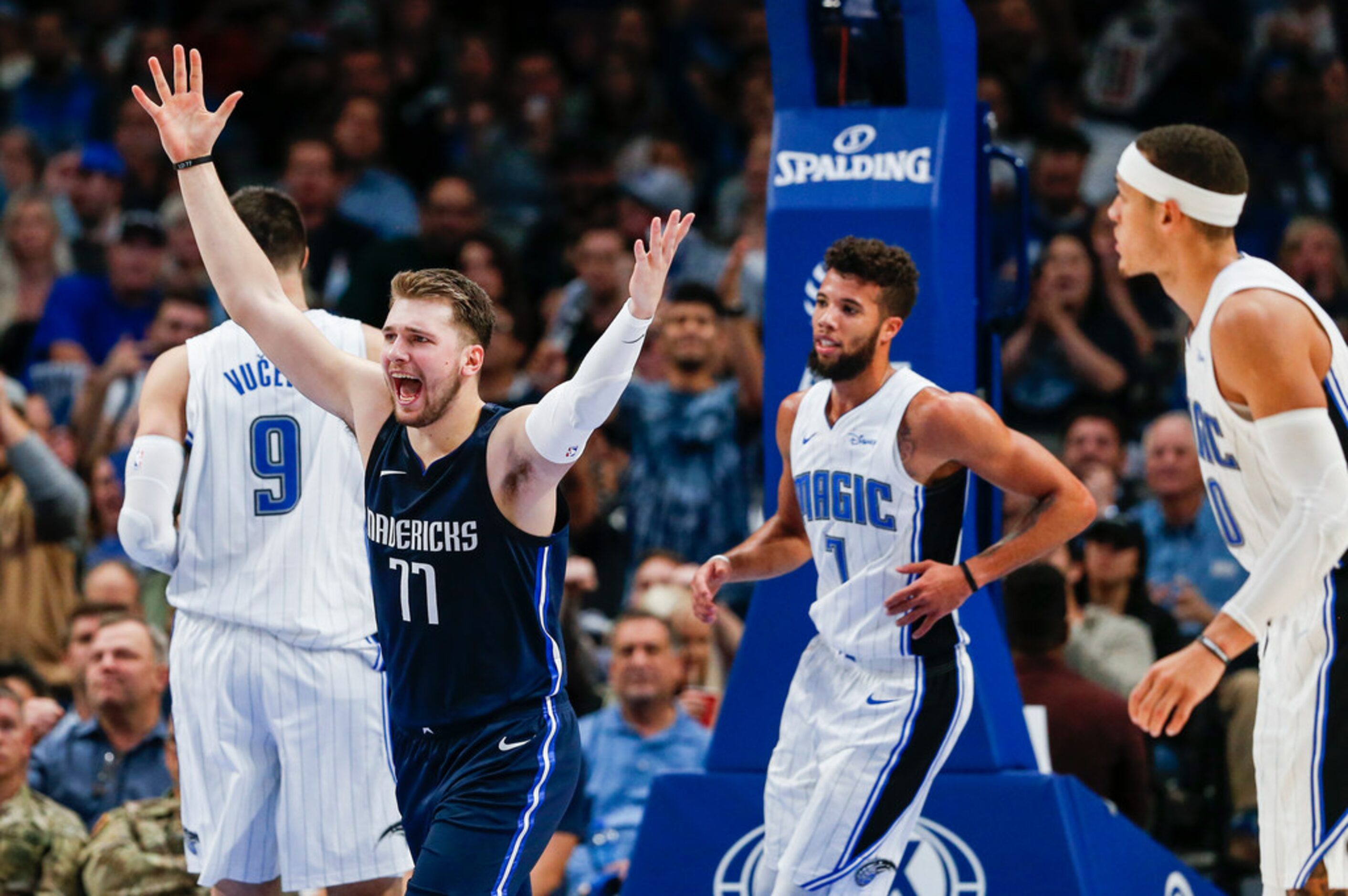 Dallas Mavericks guard Luka Doncic (77) celebrates a scoring during the fourth quarter of an...