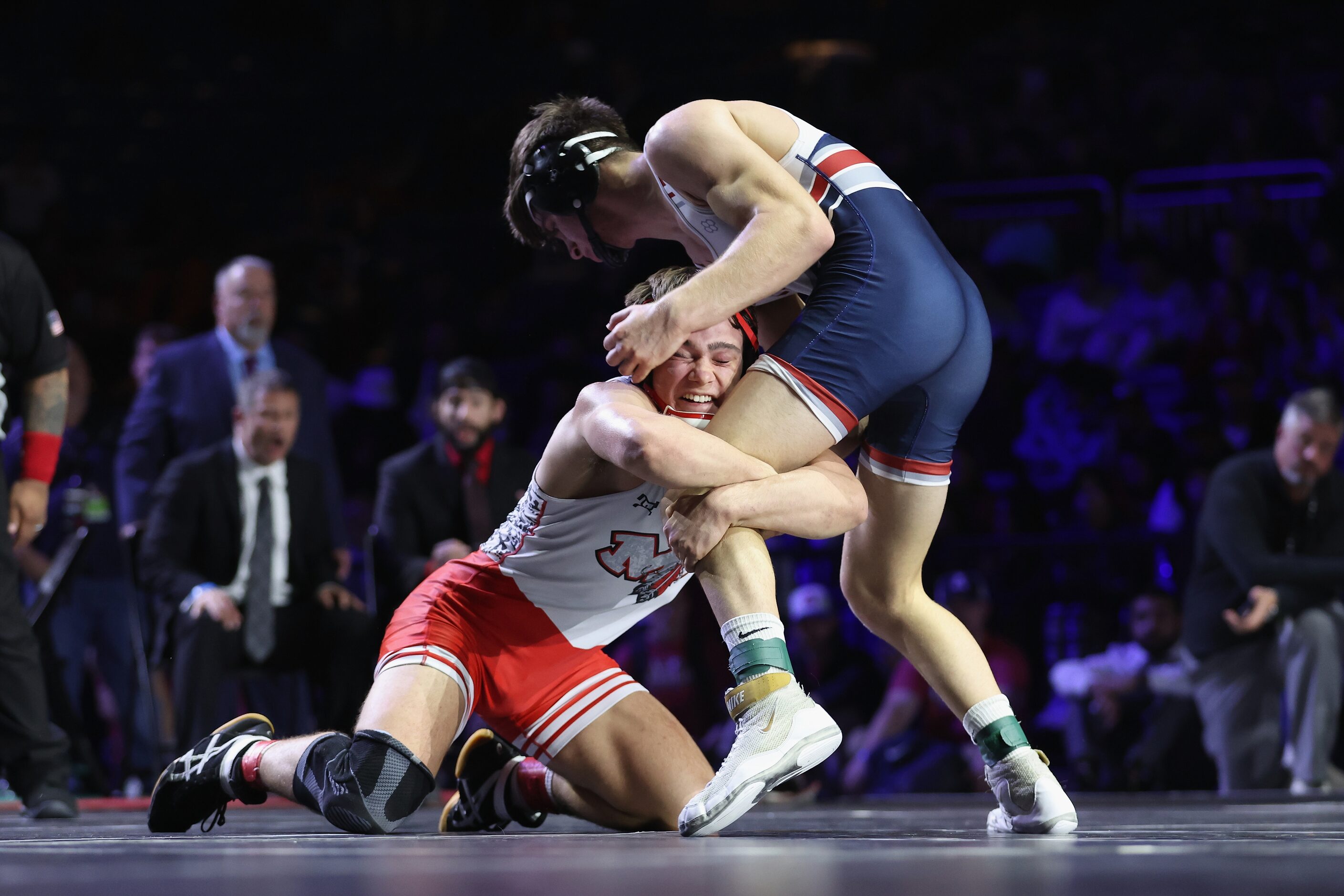 Grayson Carpenter of Arlington Martin (red) competes against Matteo Nikolov of Katy Tompkins...