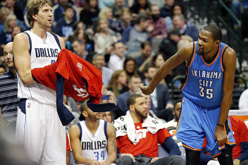 Oklahoma City Thunder forward Kevin Durant (35) talks to Dallas Mavericks forward Dirk...