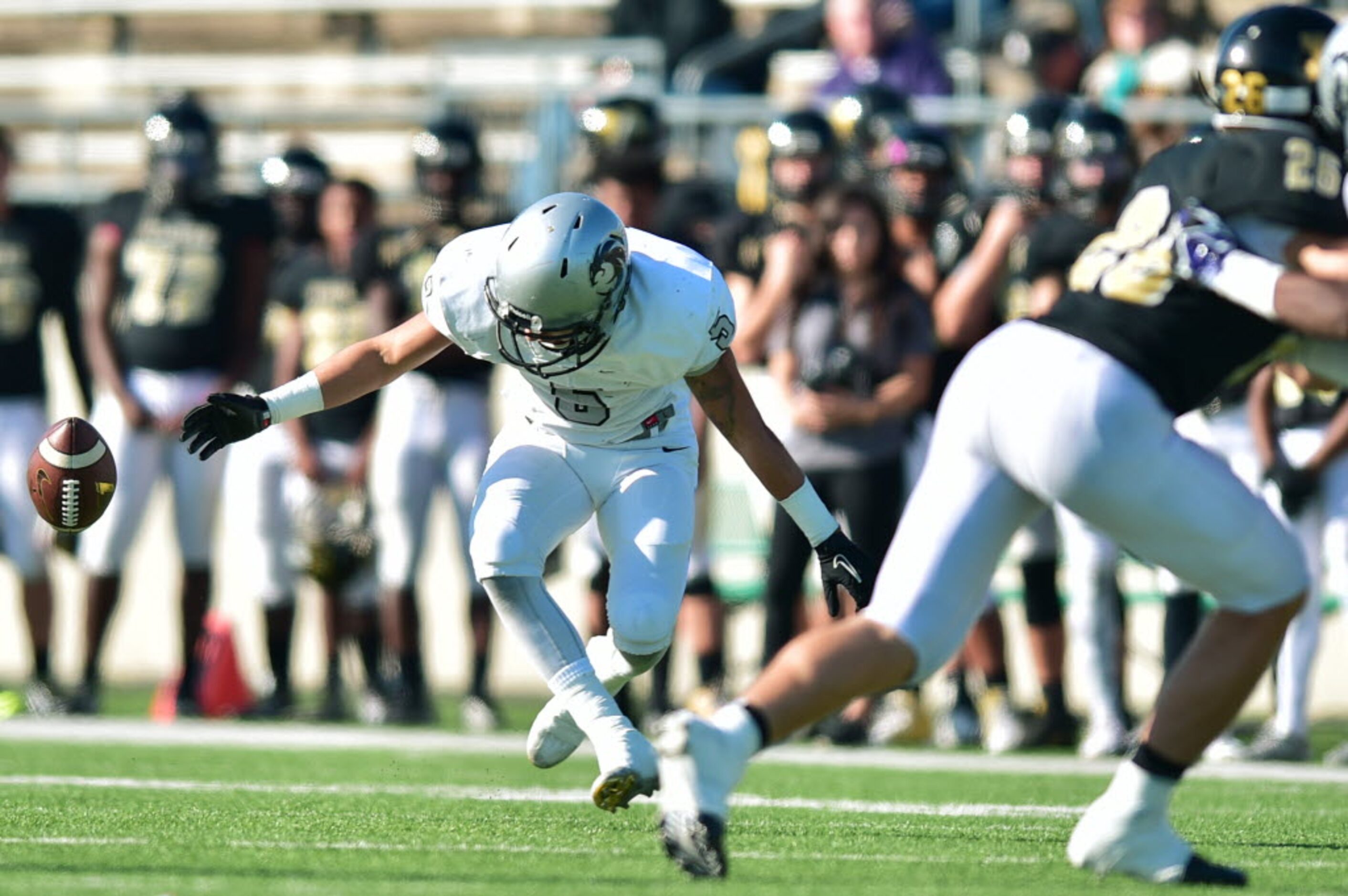 Guyer senior wide receiver Brandon Daniel (5) drops a pass against Mansfield, in a UIL Class...