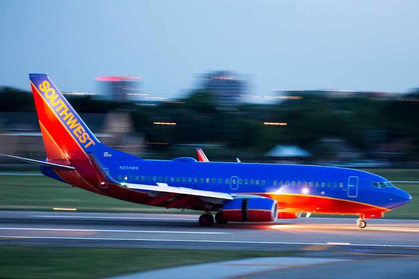 A Southwest airlines 737 lands at at Love Field on Tuesday, June 6, 2017, in Dallas. (Smiley...