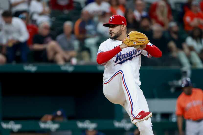 Texas Rangers starting pitcher Martin Perez (54) delivers a pitch during the seventh inning...