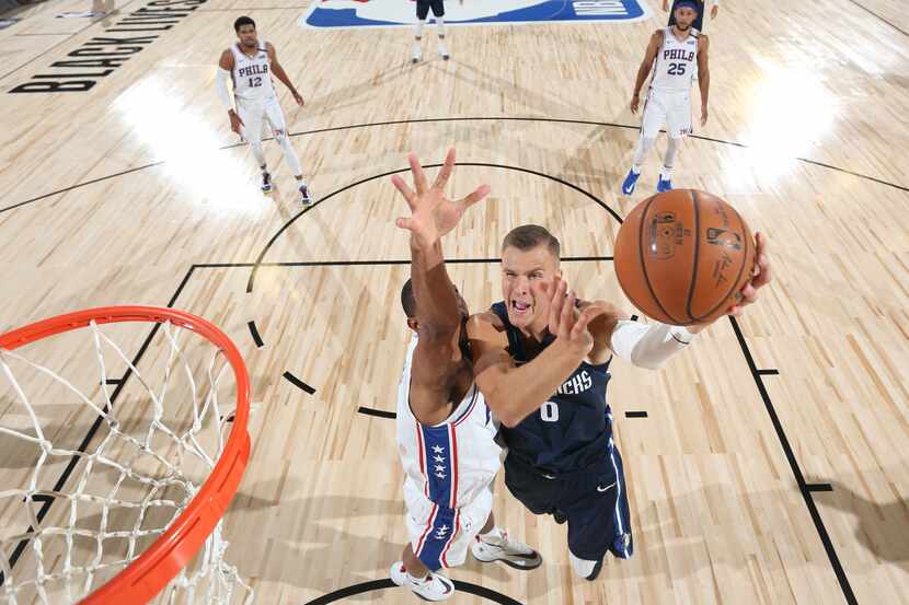 Kristaps Porzingis shoots the ball against the Philadelphia 76ers during a scrimmage on July...