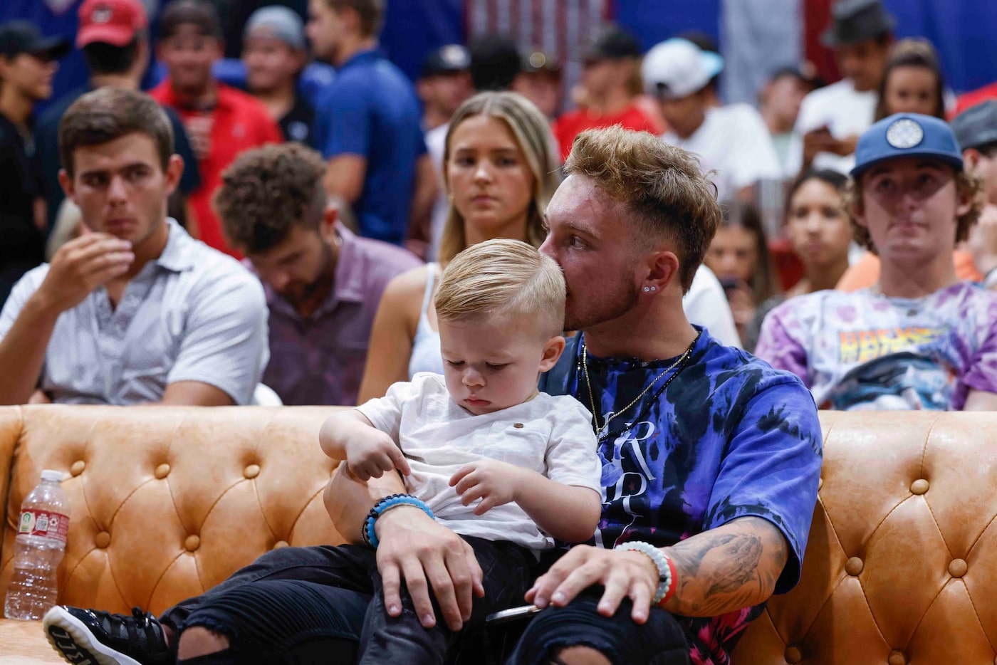 Rockwall-Heath baseball player Jett Williams Weston kisses his nephew Weston Stolusky, 2, as...