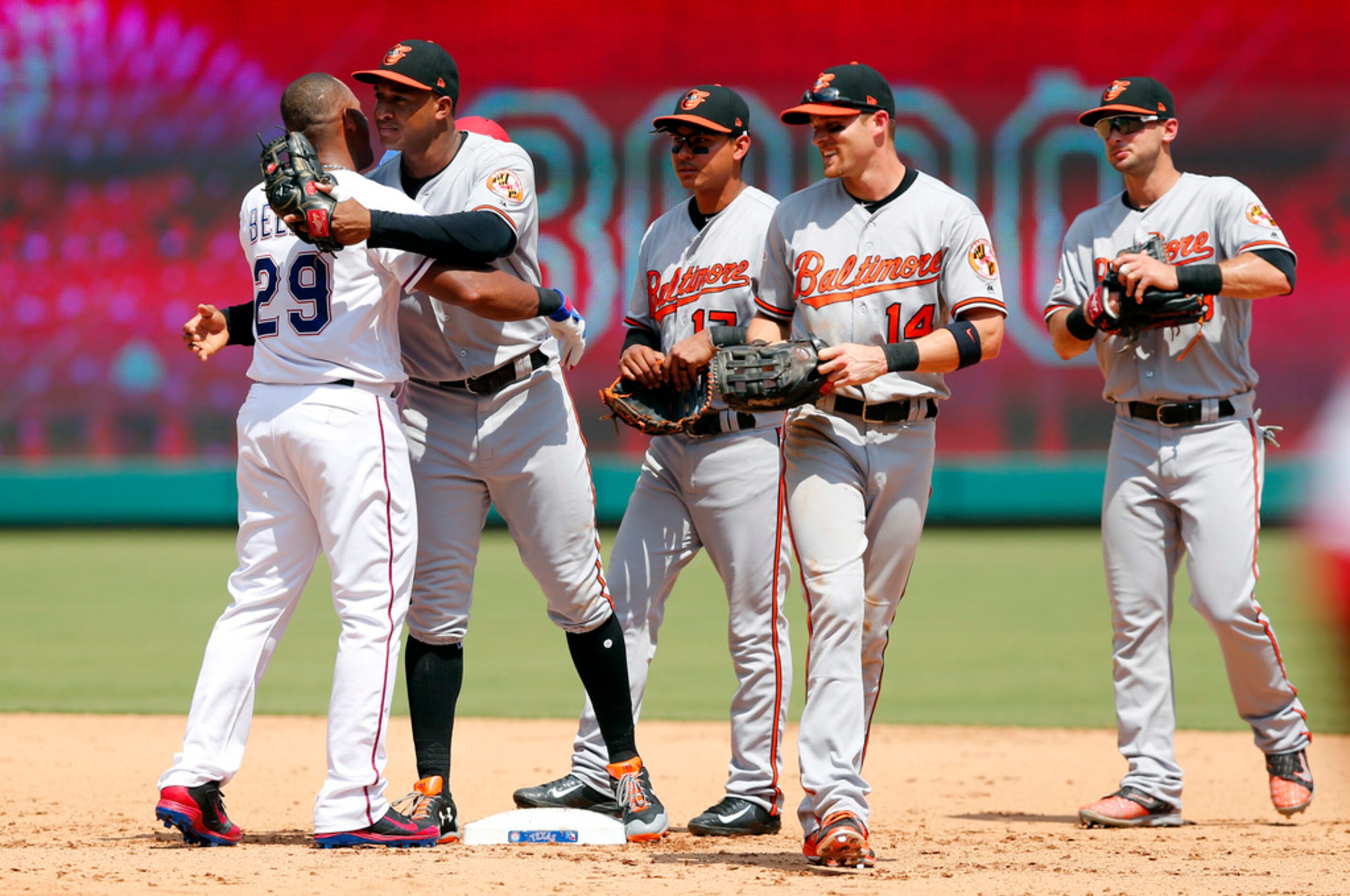 Baltimore Orioles players line up, including (from left) Jonathan Schoop , Ruben Tejada,...