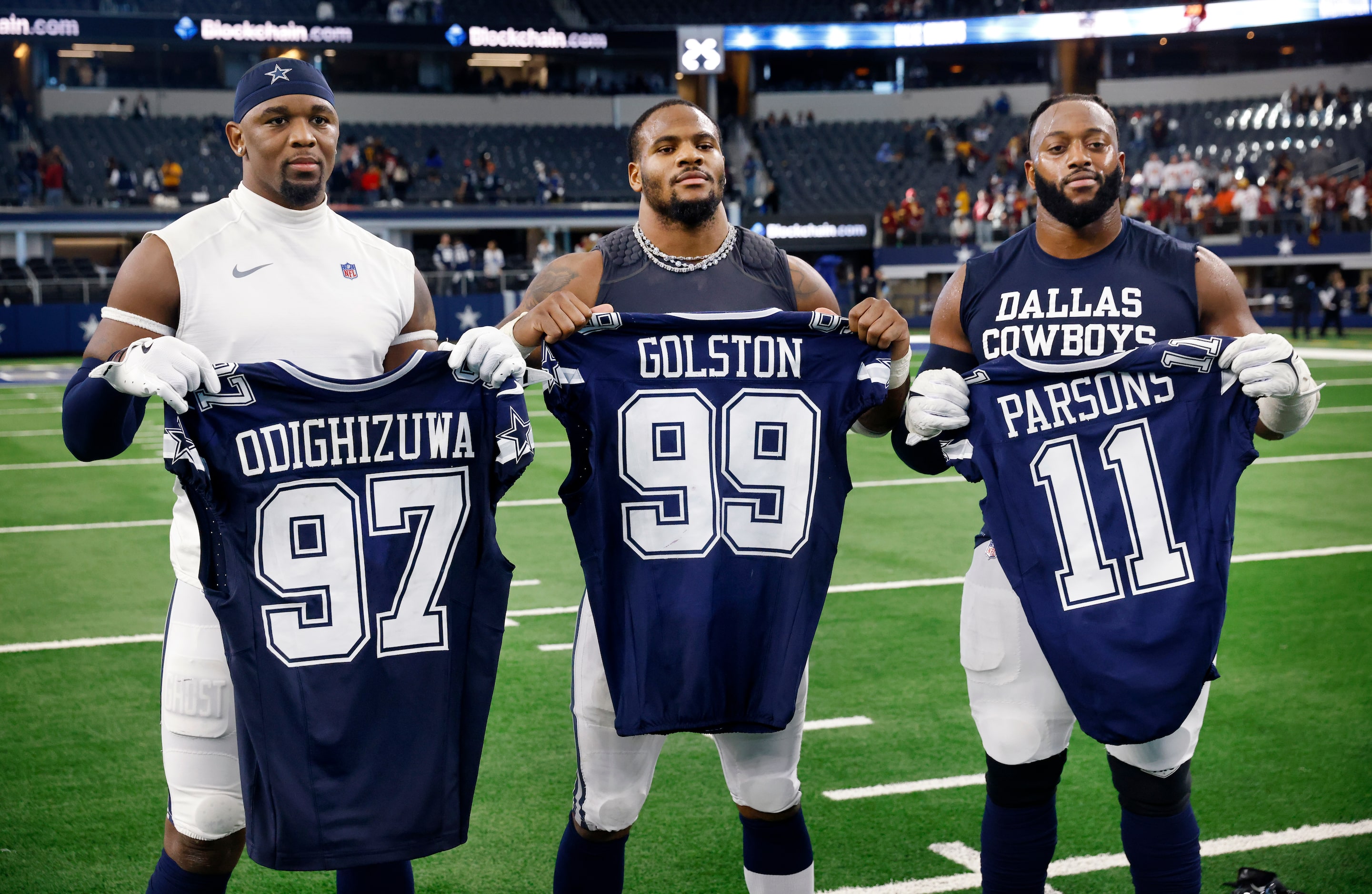 (From left) Dallas Cowboys defensive end Chauncey Golston (99), linebacker Micah Parsons...