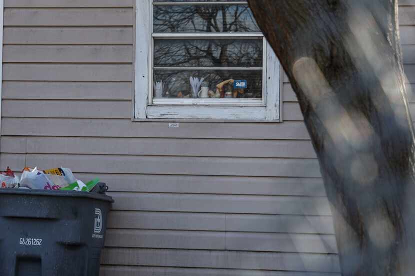 A bullet hole is seen below the kitchen window where Crystal Rodriguez, 18, was struck in...