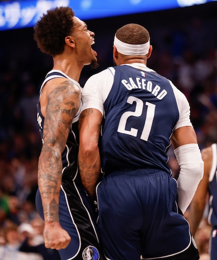 Dallas Mavericks forward P.J. Washington (25) celebrates Dallas Mavericks center Daniel...