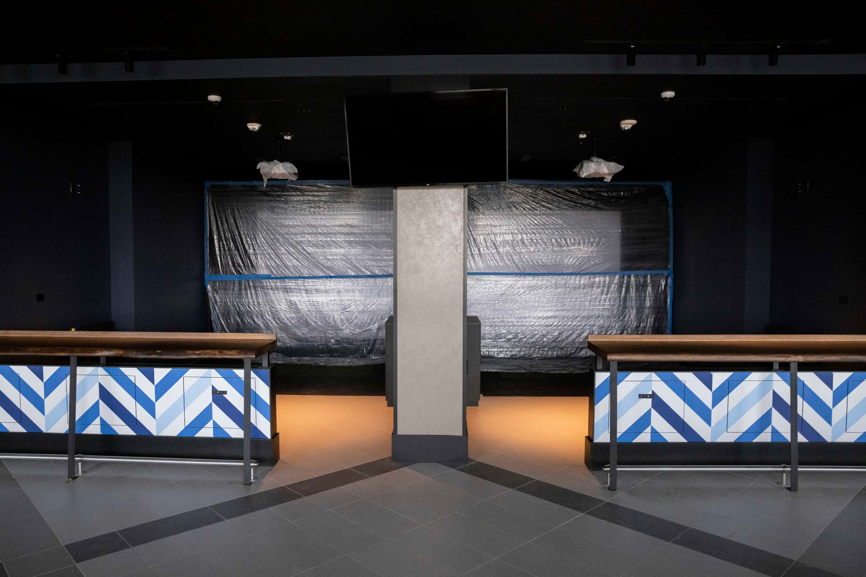 An indoor area for virtual games is being prepped at the Lounge by Topgolf located in the...
