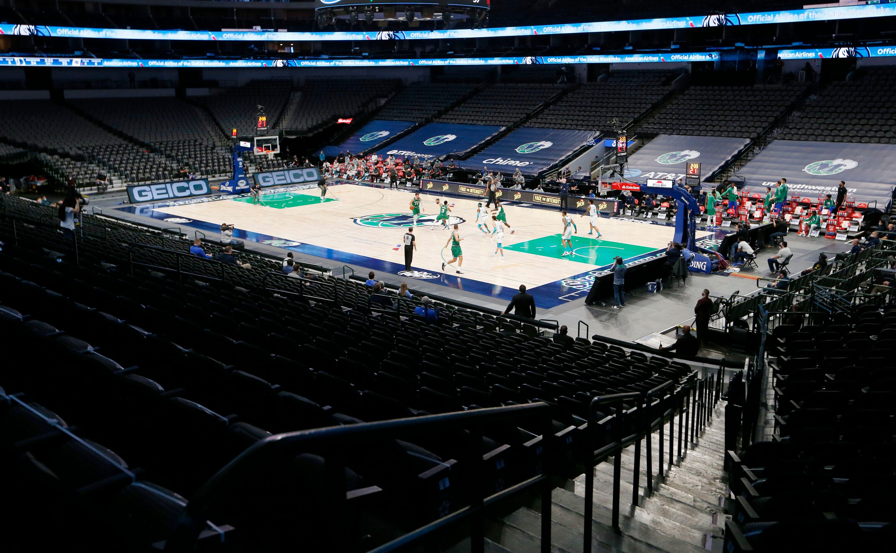 No fans allowed in the arena as the Dallas Mavericks and Charlotte Hornets play in the first...