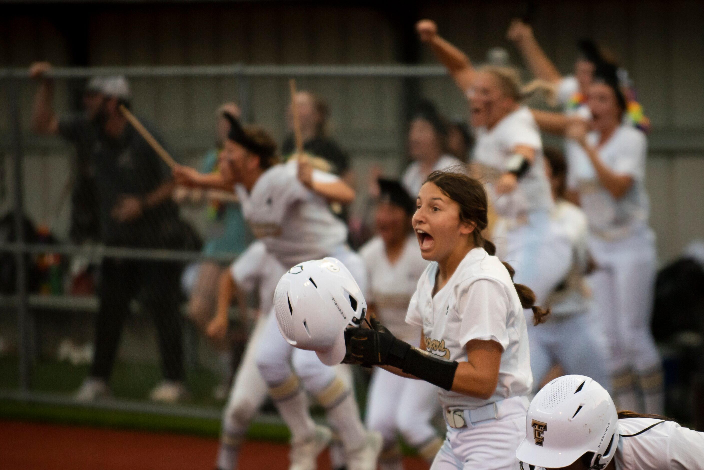 The Colony’s Sabrina Wick (7) exclaims as a teammate gets a hit during game two of the Class...