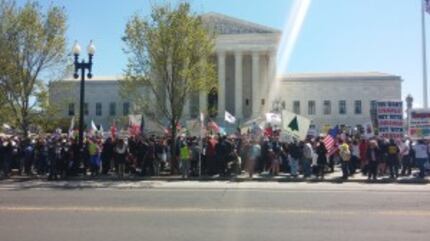  The crowd gathered in front of the Supreme Court today. (Michael Marks/staff)