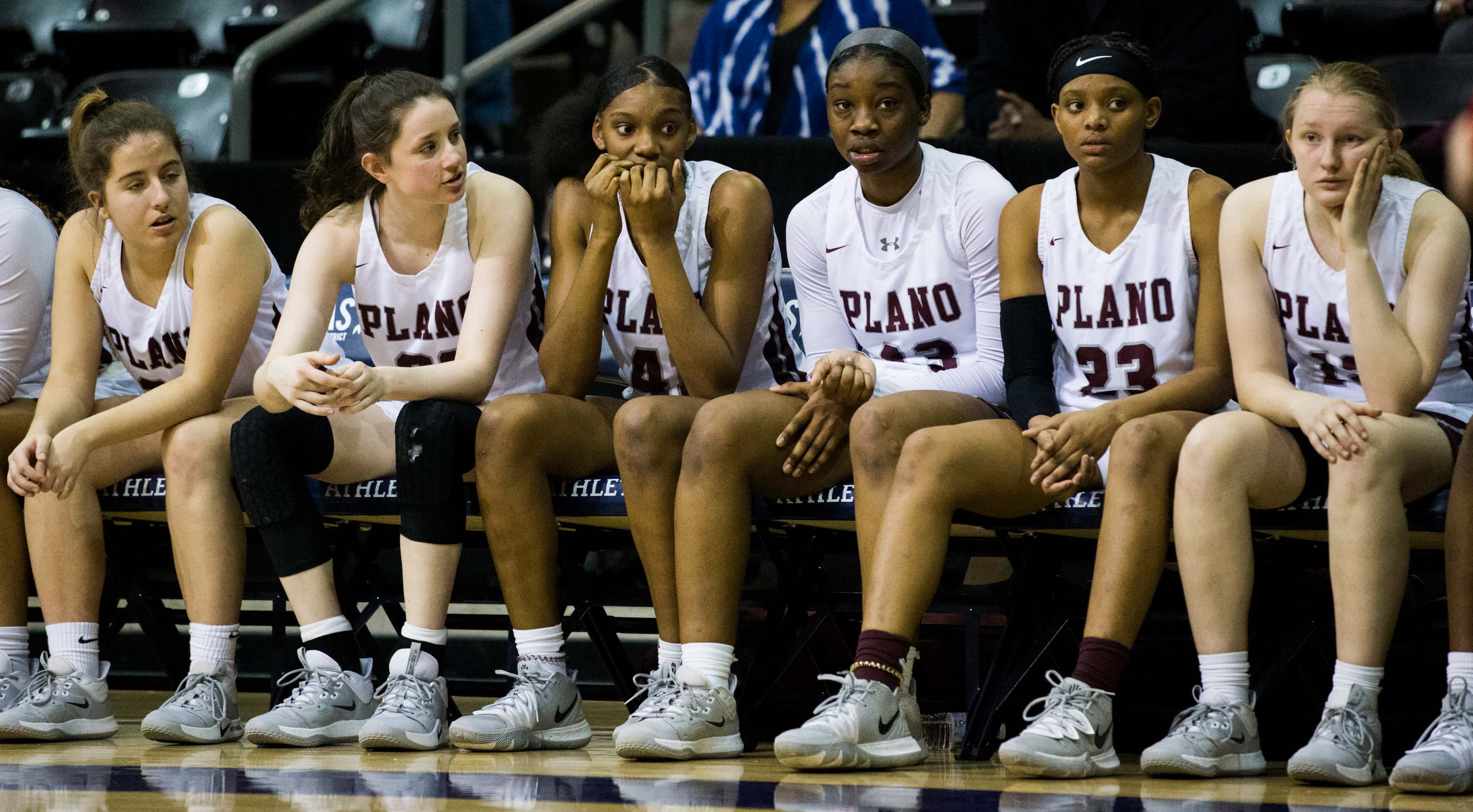 Plano players watch from the bench during the fourth quarter of a UIL 6A Region II semifinal...