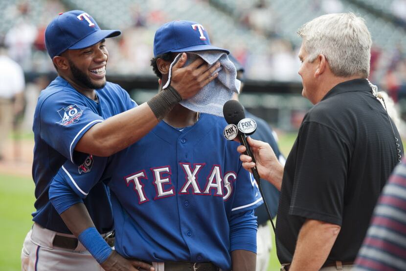 CLEVELAND, OH - SEPTEMBER 02: Elvis Andrus #1 smears shaving cream on the face of rookie...