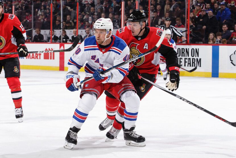 OTTAWA, ON - DECEMBER 13: Dion Phaneuf #2 of the Ottawa Senators skates against Michael...