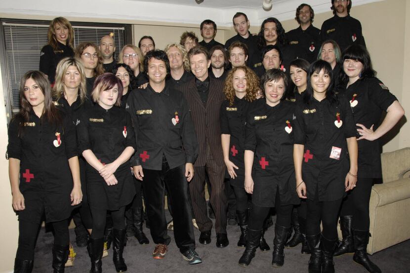 The Polyphonic Spree with David Bowie, who tapped them to play the High Line Festival in...