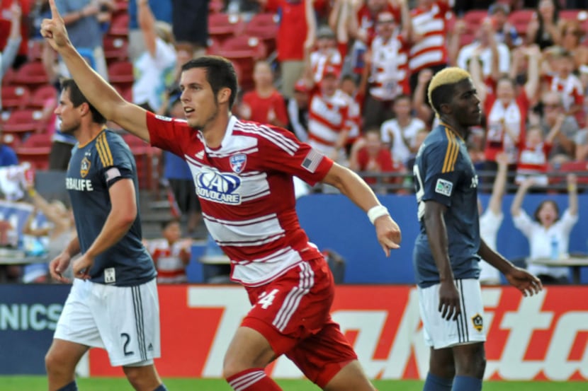 FC Dallas' Matt Hedges (24) celebrates his goal near LA Galaxy's Todd Dunivant (2) and Gyasi...