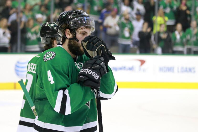 Dallas Stars defenseman Jason Demers (4) reacts after losing to the St. Louis Blues in Game...