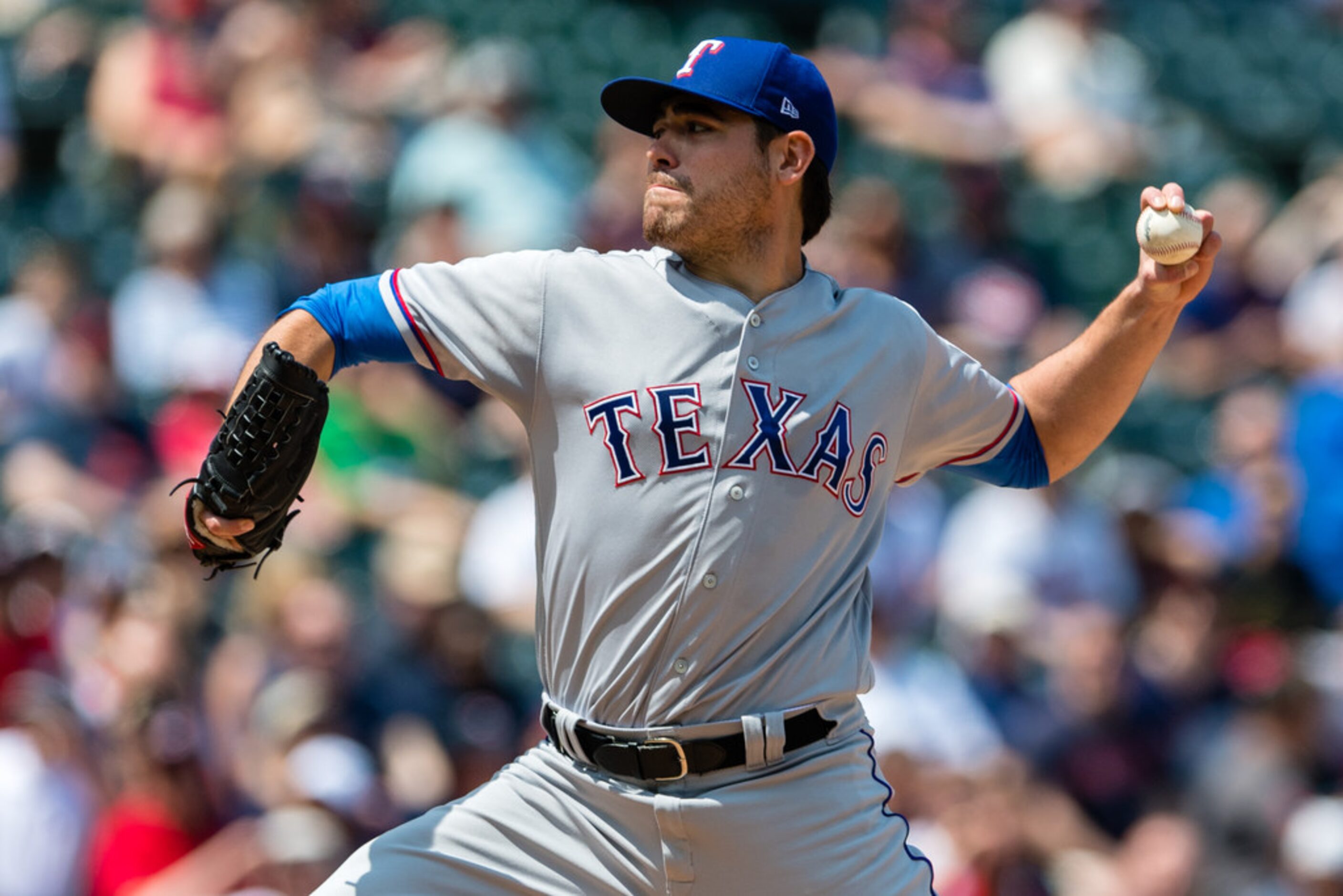 CLEVELAND, OH - MAY 2: Starting pitcher Matt Moore #55 of the Texas Rangers pitches during...