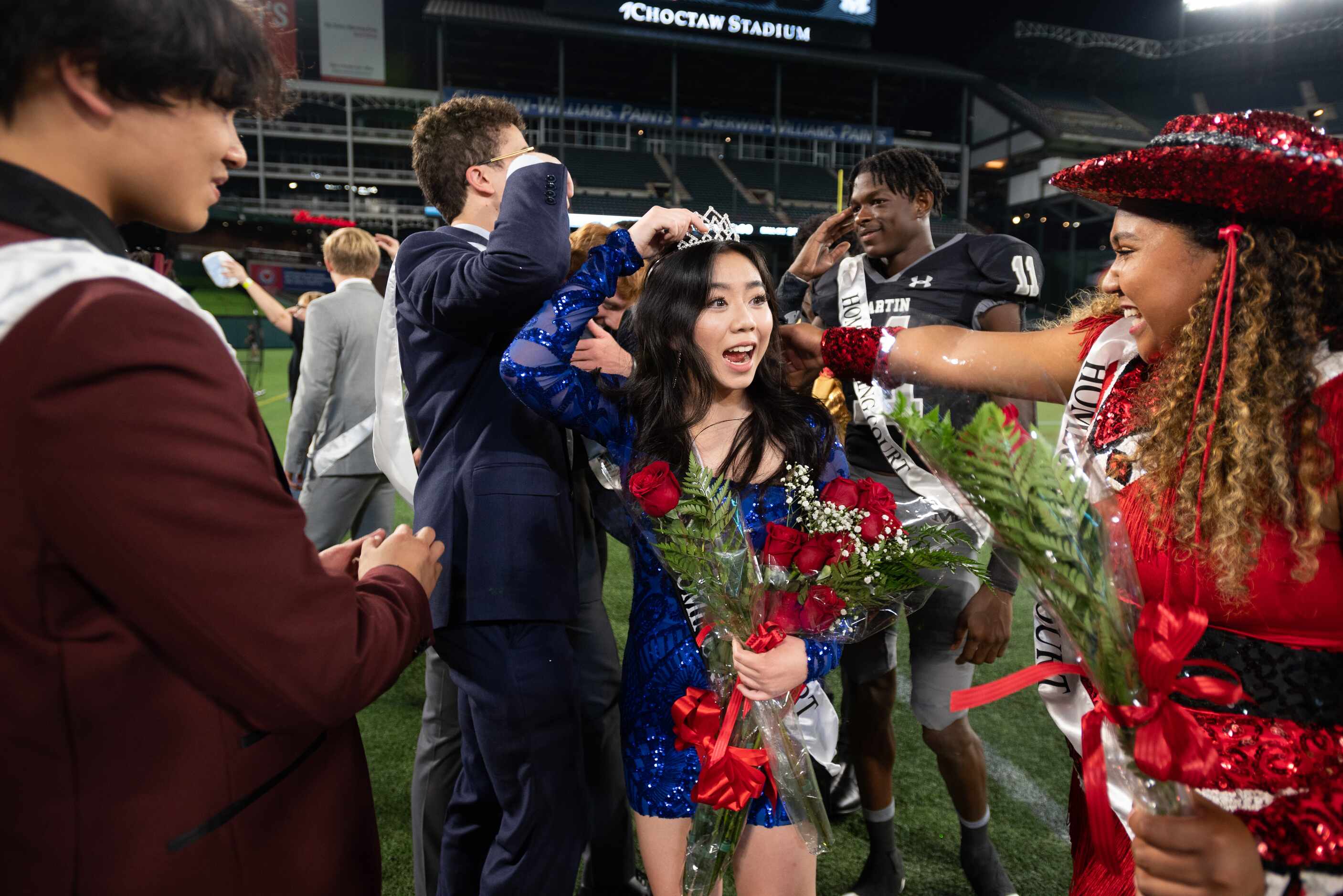 Vivian Nguyen reacts as she's being congratulated after being announced this year's...