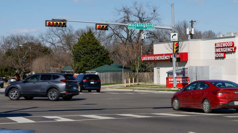 Drivers run a red light at the intersection of Mockingbird Lane and Skillman Street on...