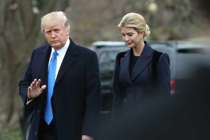 President Donald Trump and his daughter Ivanka Trump walk toward Marine One, departing from...
