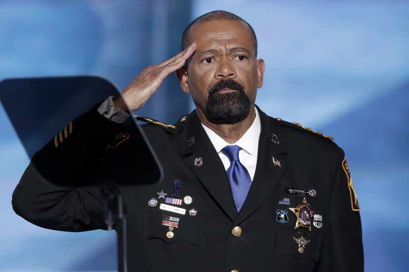 David Clarke, sheriff of Milwaukee County, Wis., saluted after speaking during the opening...