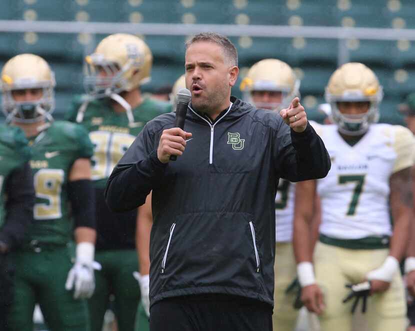 Baylor head coach Matt Rhule talks to players and fans before the start of their their...