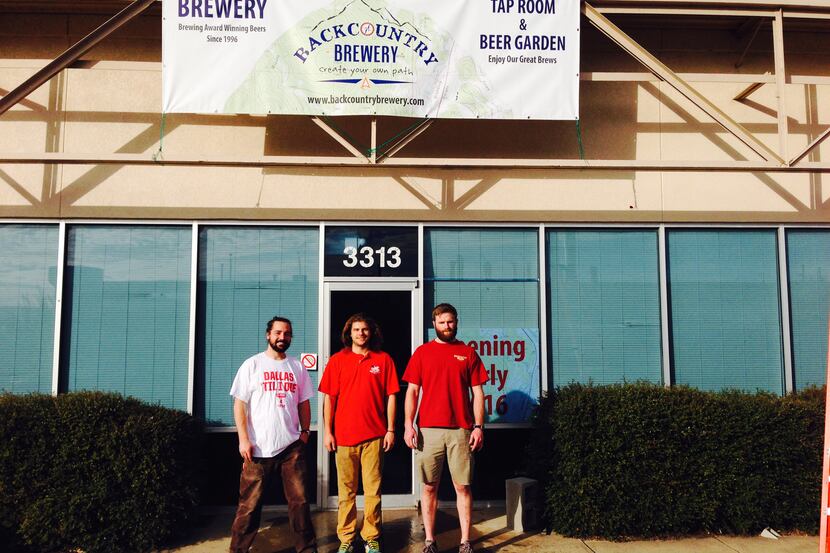 Backountry brewer JP VanderVeen, Jimmy Eazor, and brewer Dan Lewis outside of the former...
