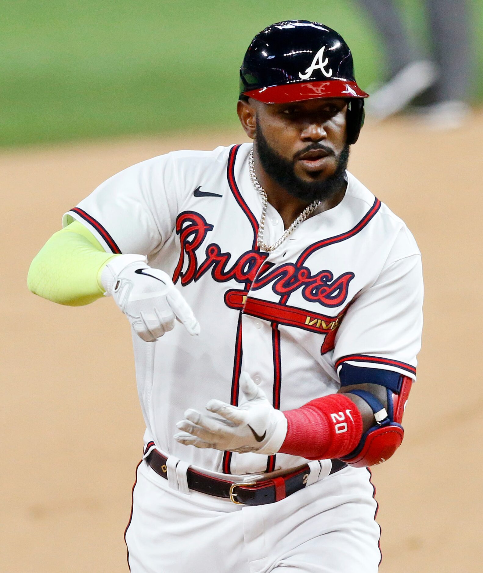 Atlanta Braves designated hitter Marcell Ozuna (20) celebrates his fourth inning home run as...