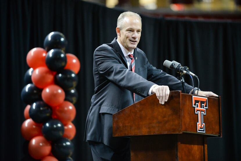 Texas Tech's new head football coach Matt Wells addresses the crowd and press about why he...