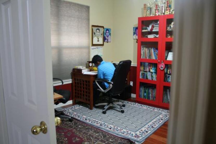 
Lokesh Nagineni holes up in his study space at his home in Flower Mound. The Lamar Middle...