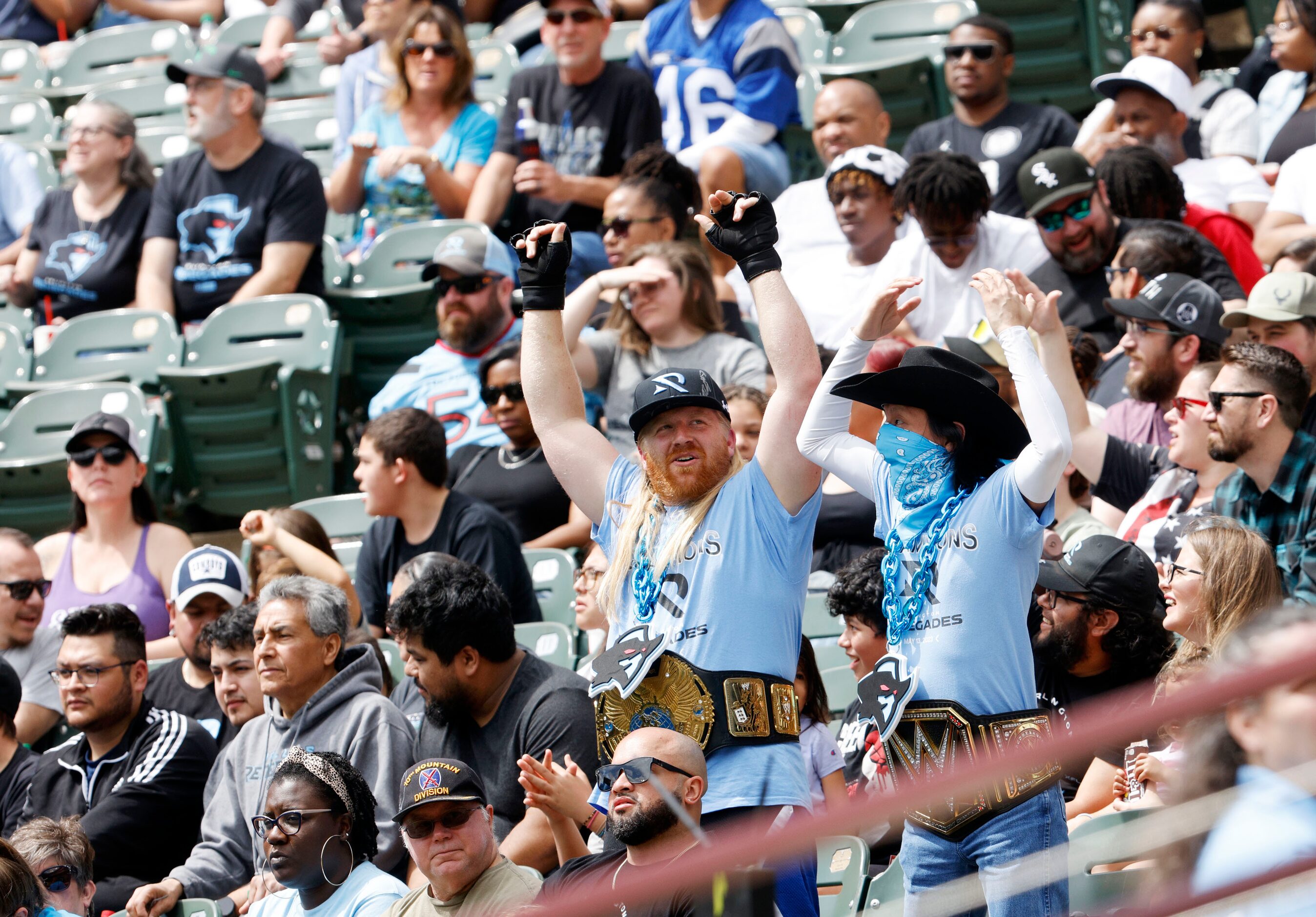 Arlington Renegades fans cheer during the first half of a football game against Birmingham...